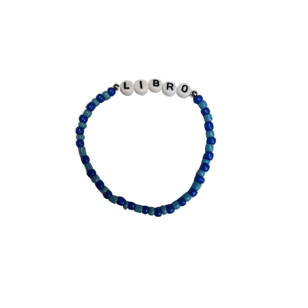 Beaded bracelet with letter beads spelling 'LIBRO' on a white background